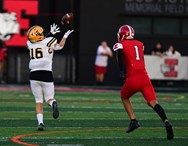 A first varsity catch launches Freedom football over Easton